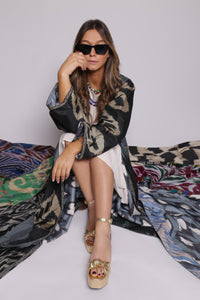 Prunelle wearing Uzbek kimono and glasses