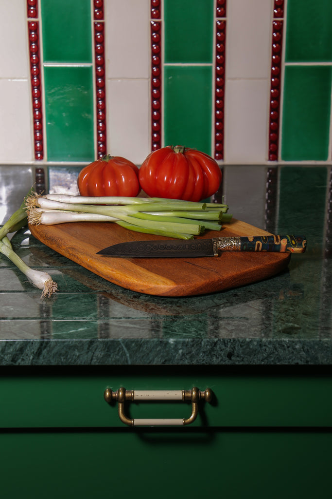 Damascus Style Handmade Uzbek Kitchen Knife on a chopping board