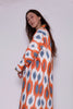 woman profile wearing orange and blue kimono