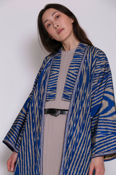 Woman wearing Bayali Uzbek kimono