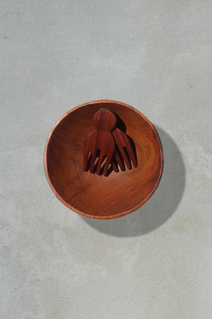 Handmade wooden salad bowl with servers
